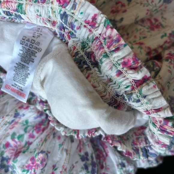 Floral ruffles skirt with built in shorts. Girl size 7 - Picture 4 of 12